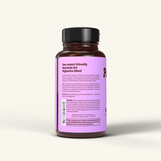 Daily Symbiotic probiotic prebiotic postbiotic capsules bottle description side of brown and light purple label.